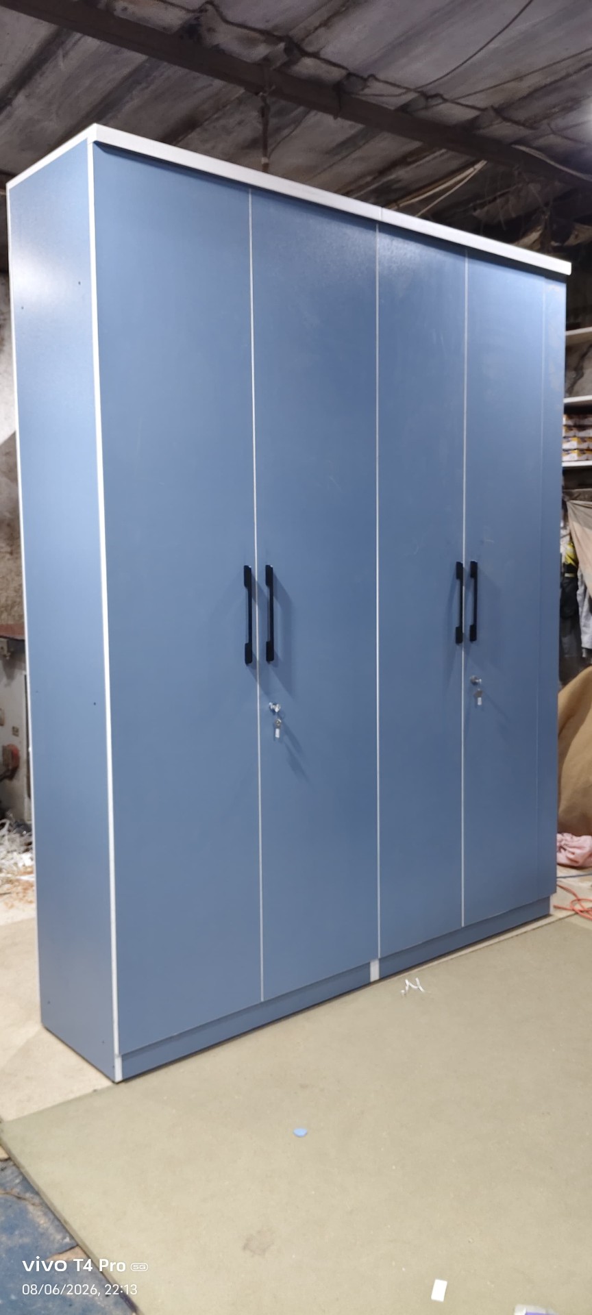 Four-Door Laminate Wardrobe — custom furniture by Qadir Furniture Manufacturers, Mumbai