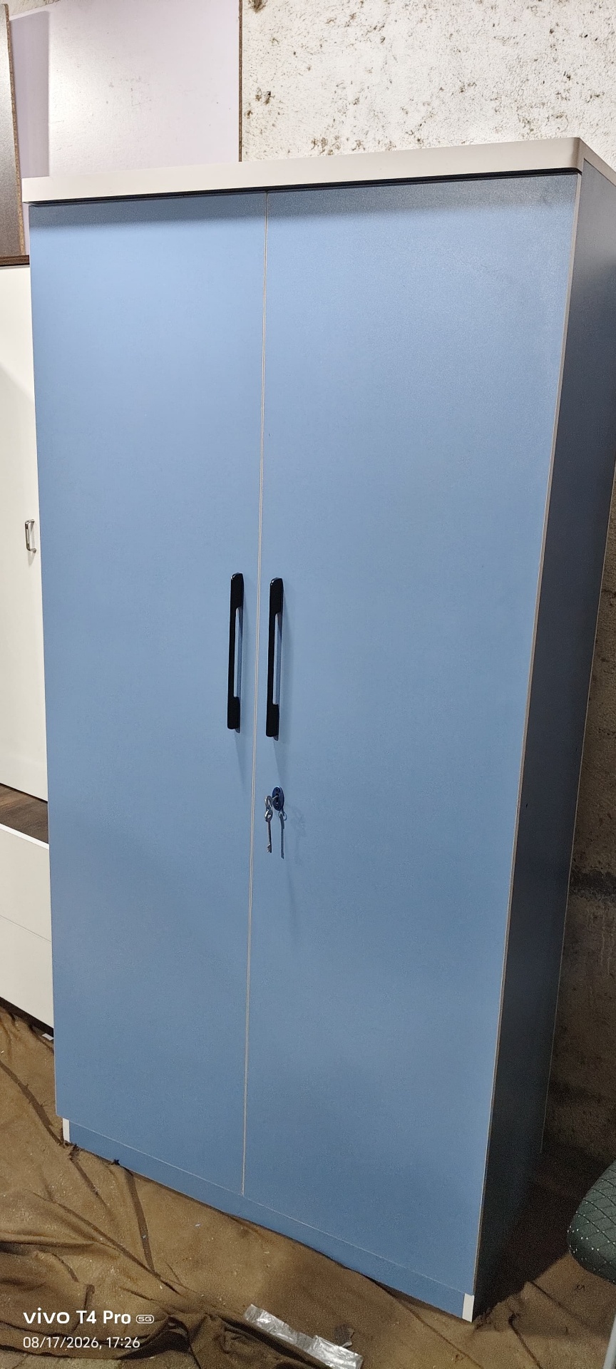 Compact Two-Door Blue Wardrobe — custom furniture by Qadir Furniture Manufacturers, Mumbai