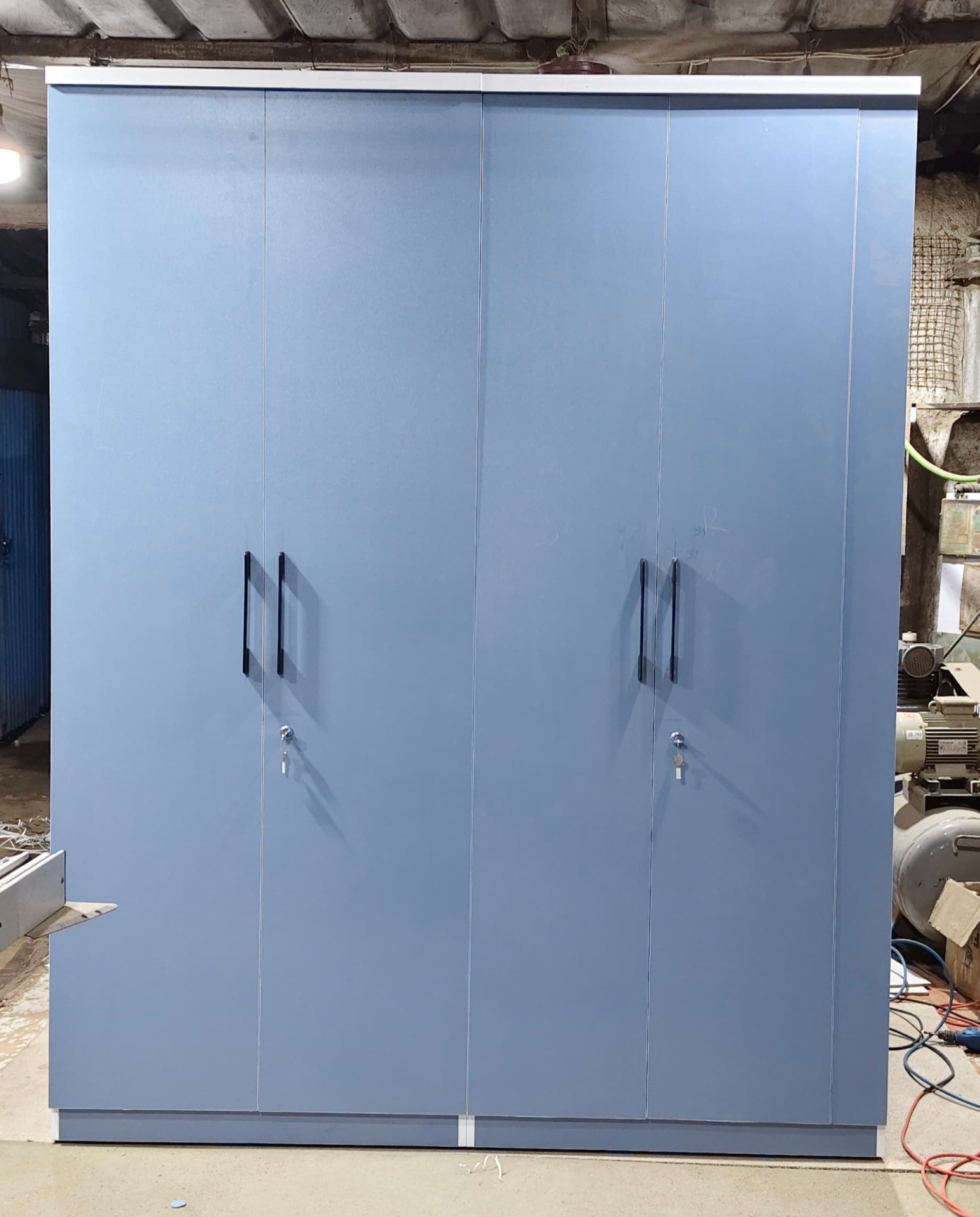 Four-Door Steel-Blue Wardrobe with Locks — custom furniture by Qadir Furniture Manufacturers, Mumbai
